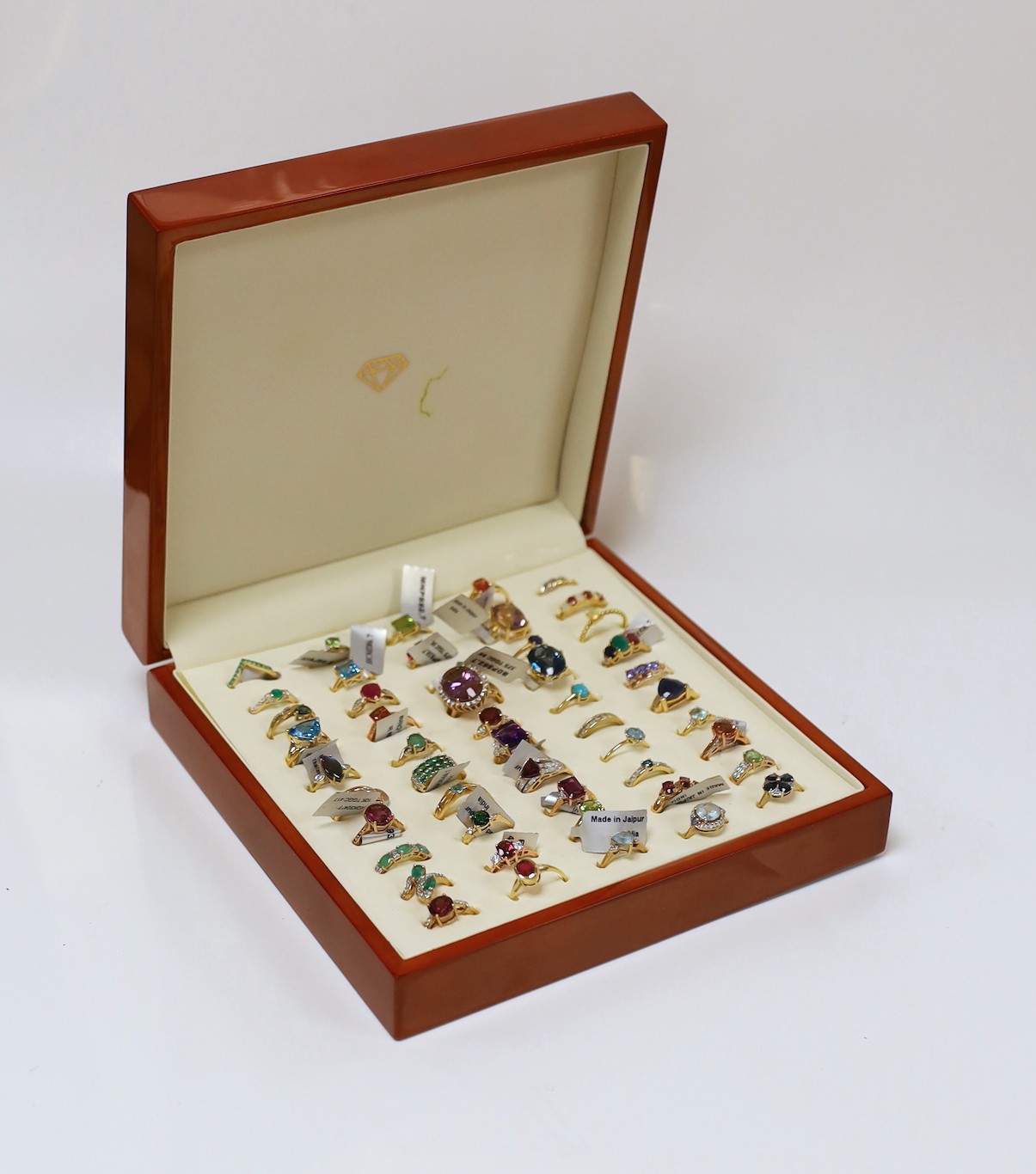 Forty three assorted modern 9ct gold and gen set dress rings including amethyst, emerald and garnet, one 18ct gold and gem set ring and six assorted 925 rings, in ring box.
